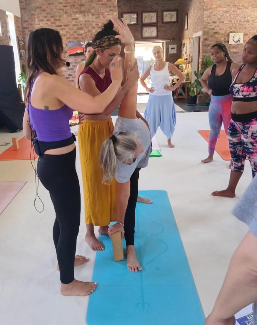 Yoga teacher training students practicing pranayama and meditation